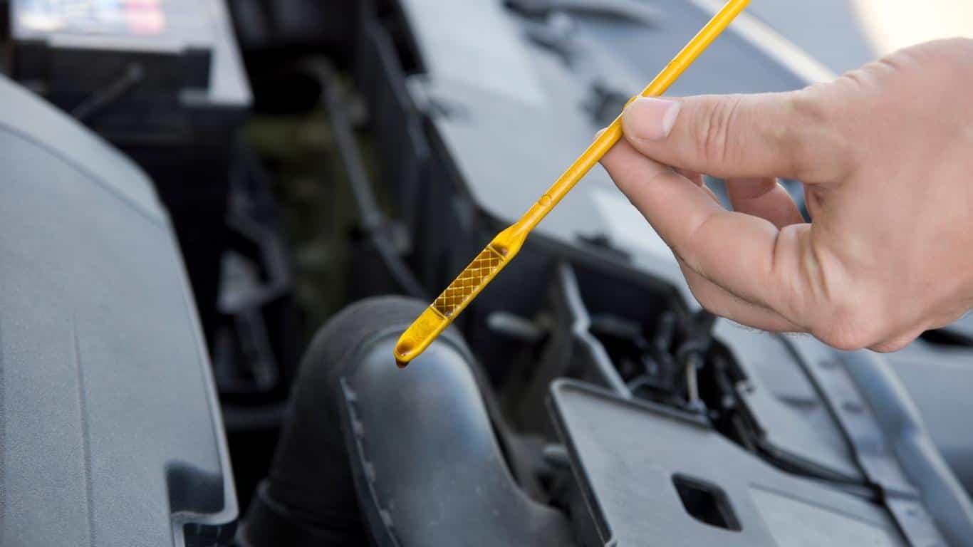 Engine oil dipstick showing lines at the tip