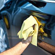 Wiping and shining a black car