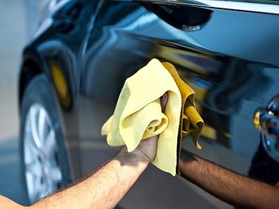 Wiping and shining a black car