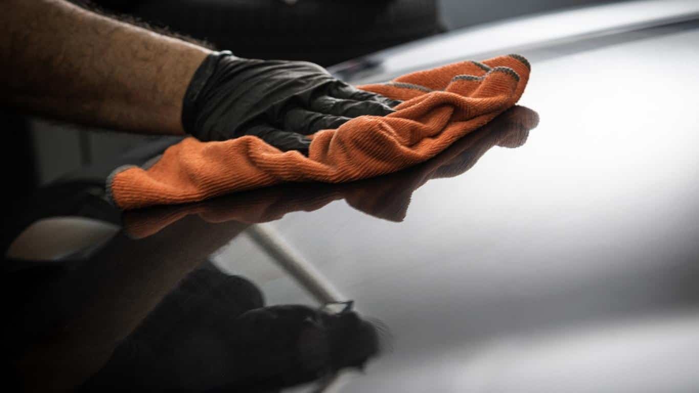 Drying and shining a black car