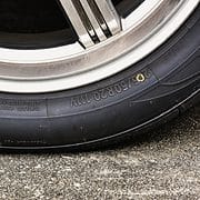 Tire sidewall showing important codes for size, speed, and load