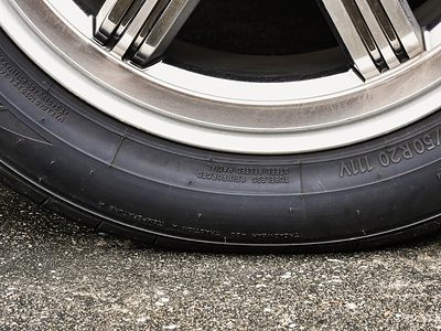 Tire sidewall showing important codes for size, speed, and load